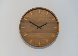 Wooden Clock display on white wall background