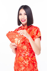 Asian woman holding red envelope with blessing words. The Chinese word means happiness or good fortune.