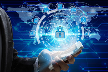 Businessman hand use smartphone with padlock icon technology