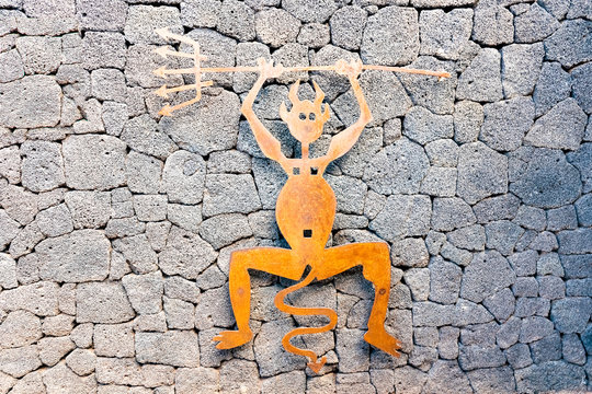 Timanfaya devil - made of oxidized iron a symbol of Timanfaya National Park, Lanzarote, Canary Islands, Spain