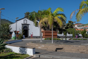 chapel behind palms