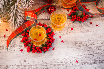 Whiskey, brandy or liquor shot and Christmas decorations