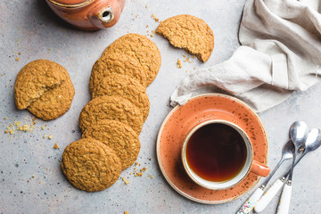 Gluten free healthy oatmeal cookies on gray stone background, top view with copy space, flat lay
