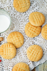 peanut butter cookies with glasses of milk