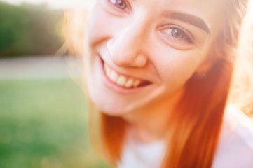 Portrait of smiling Young girl in nature