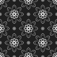 Floral vector ornament. Seamless abstract classic background with flowers. Pattern with repeating floral elements. Black and white ornament for fabric, wallpaper and packaging
