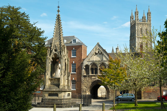 Picturesque old buildings around St Marys Gate near Gloucester Cathedral in spring sunshine, Gloucestershire, UK.