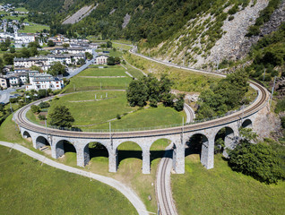 The circular viaduct - the famous railway construction in Swiss Alps mountain, a unesco heritage....