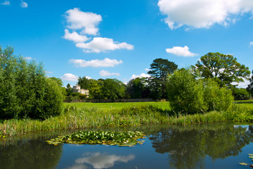 Fototapeta na wymiar Village green and ponds at Frampton on Severn, Gloucestershire,