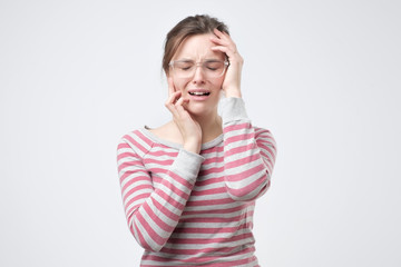 Portrait of displeased upset female frowns face as going to cry, being discontent and unhappy....