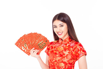 Asian woman holding red envelope with blessing words. The Chinese word means happiness or good fortune.