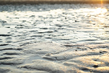 Texture of sand on beach sunset
