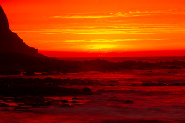 Red sunset in Norway by the sea