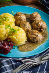 Meatballs with potatoes in dill sauce.