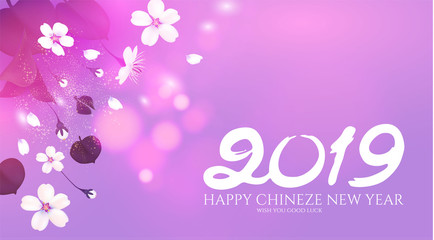 Chineze New Year Background with Blooming Cherry and Bokeh Effect.