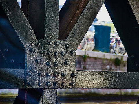 Bridge construction on rivets above the canal