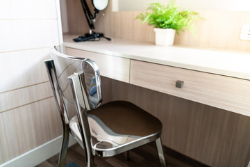 Cozy work space in home with desk chair.