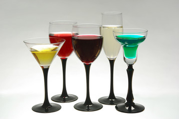 Five glasses of wine and cocktails