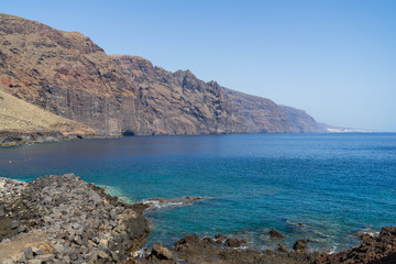 Fototapeta na wymiar Vertical cliffs Acantilados de Los Gigantes (Cliffs of the Giants). View from Cape Teno (Punta de Teno). Tenerife. Canary Islands. Spain.