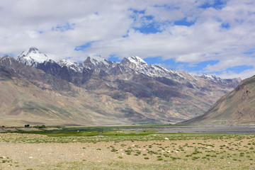 Zanskar landscape view with Himalaya mountains covered with snow and blue sky in Jammu & Kashmir, India,