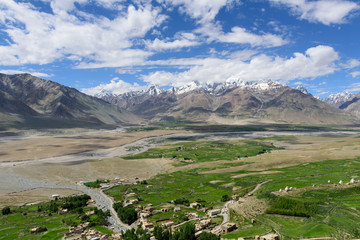 Zanskar valley landscape view from Karsha Gonpa with Himalaya mountains covered with snow and blue sky in Jammu & Kashmir, India,