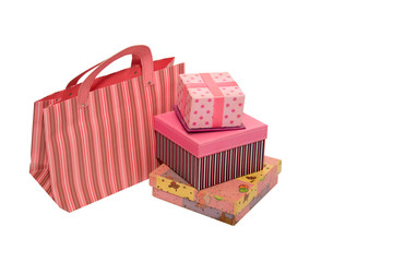 pink gift boxes with ribbons and gift bag striped isolated background