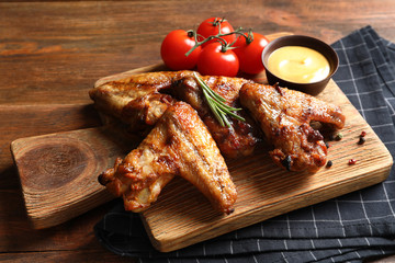 Delicious meat served for barbecued party on wooden table