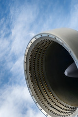 Close up professional artificial snow machine cannon on cloudy sky