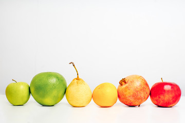 Creative layout made of fruits on a white background