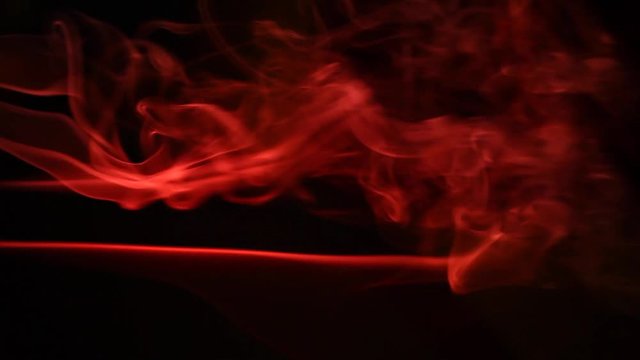 red smoke aroma sticks dark background hd footage 