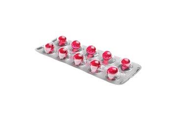 Pills in blister pack on white background