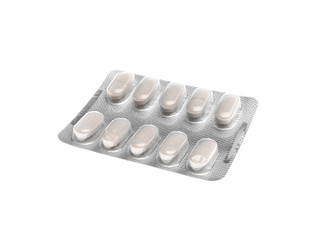 Pills in blister pack on white background