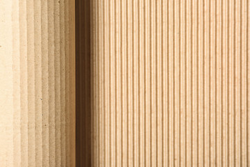 Corrugated cardboard as background, top view with space for text. Recyclable material