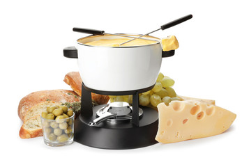 Composition with pot of delicious cheese fondue on white background