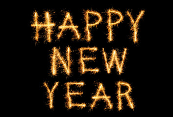 Happy new year text with sparkle fireworks isolated on black