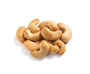 Tasty organic cashew nuts isolated on white