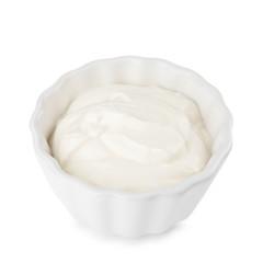 Fototapeta na wymiar Bowl with sour cream on white background