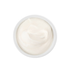 Bowl with sour cream on white background, top view