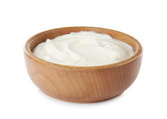 Bowl with sour cream on white background