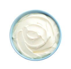 Bowl with sour cream on white background, top view