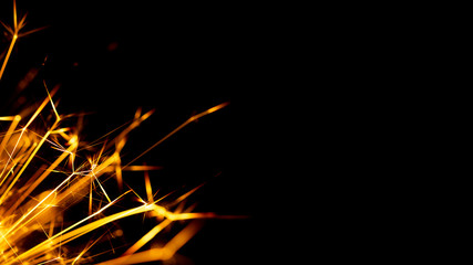 Fototapeta premium Christmas sparkler isolated on black background. Bengal fire