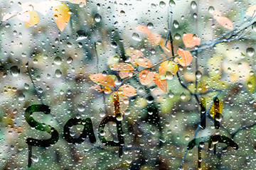 sweaty glass with different words and signs