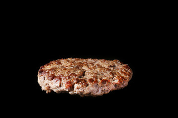 grilled burger patty isolated black