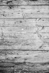 Old vintage wooden planks of the house. Grey wood texture background.