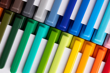 Fototapeta premium Multi-colored markers in white packaging