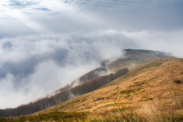 Big clouds and fog in the mountains. Bieszczady National Park - Poland