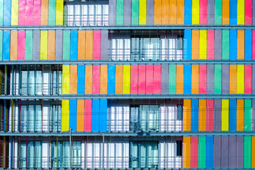 Building with multicolored shutters in Athens, Greece. The background