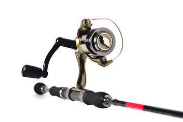 fishing reel on a fishing rod, white background close-up, copy space
