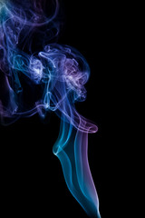 Fototapeta premium Blue smoke on black background