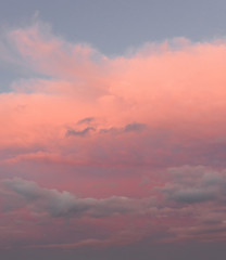 Beautiful pink clouds at sunset texture background